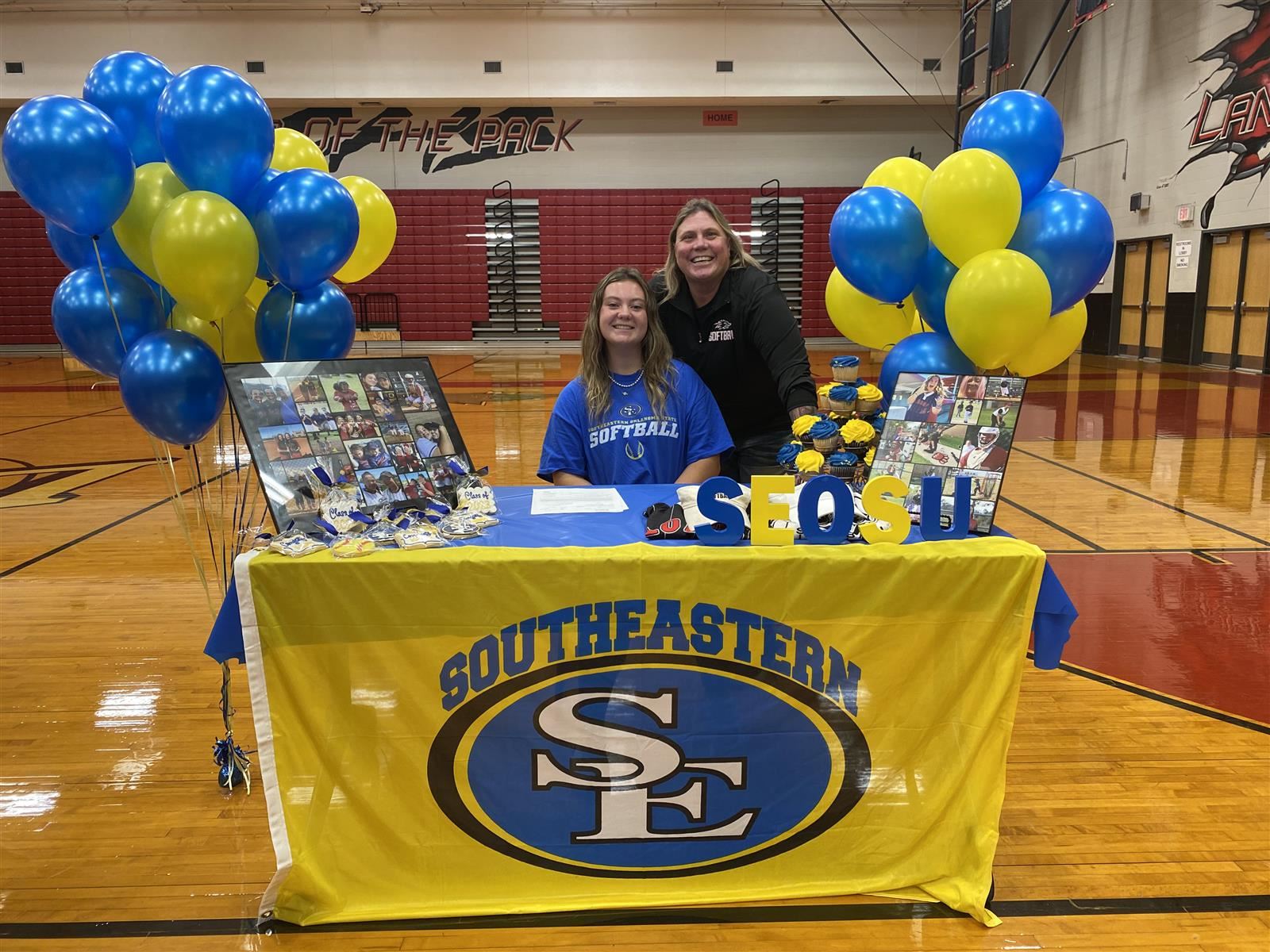 Langham Creek senior Kasey Simmons, seated, signed a letter of intent to Southeastern Oklahoma State University.